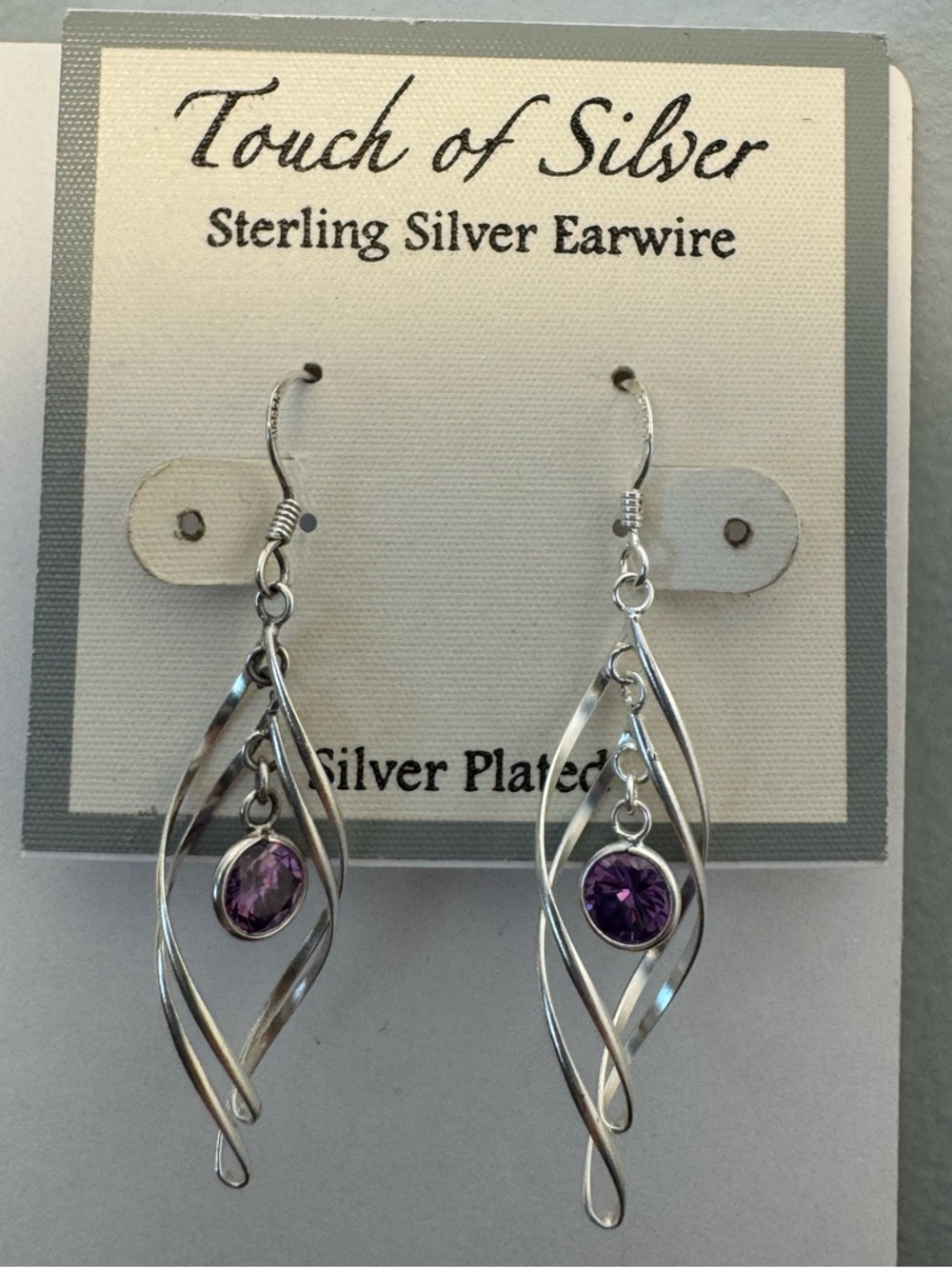 Touch of Silver twist swirl dangle earrings. lavender purple gemstone.